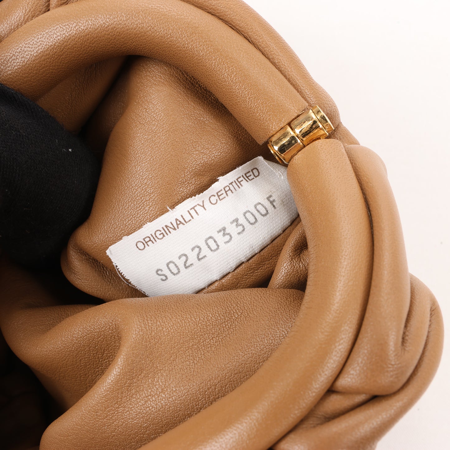 Bottega Veneta Micro The Pouch Leather Crossbody bag in Almond