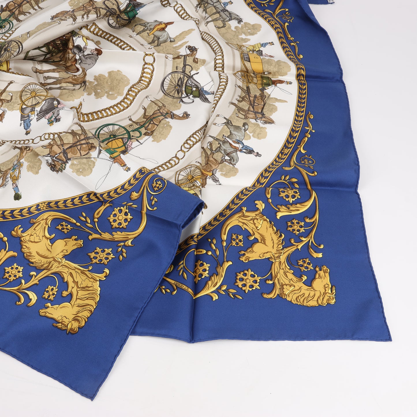 Hermès Carré 90 "LA PROMENADE DE LONGCHAMPS" 100% Silk Scarf in Navy Blue