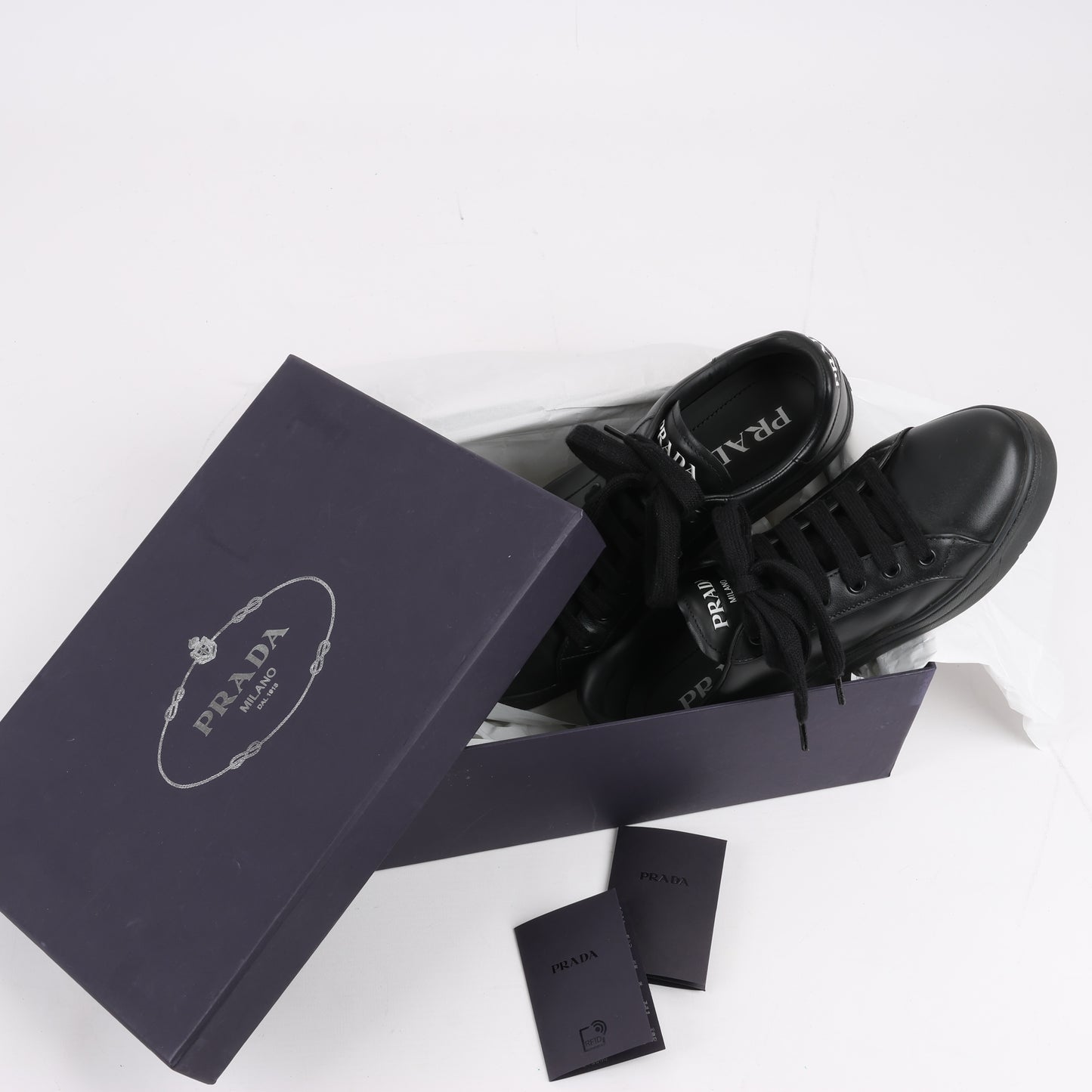 PRADA Logo-Leder-Sneaker in Schwarz × Weiß 1E282N, Größe 37,5 EU