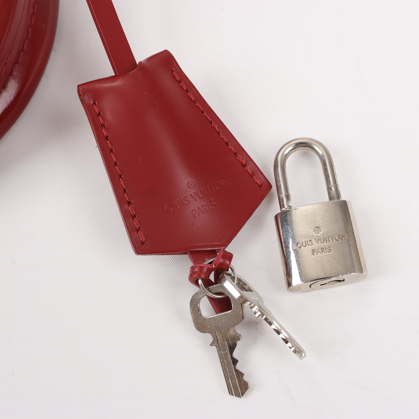Louis Vuitton Epi Leather Alma Handbag in Deep Red M4030M