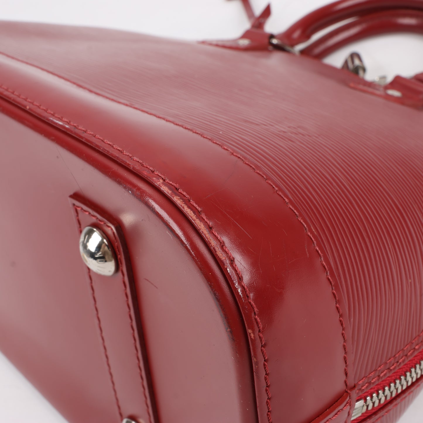 Louis Vuitton Epi Leather Alma Handbag in Deep Red M4030M