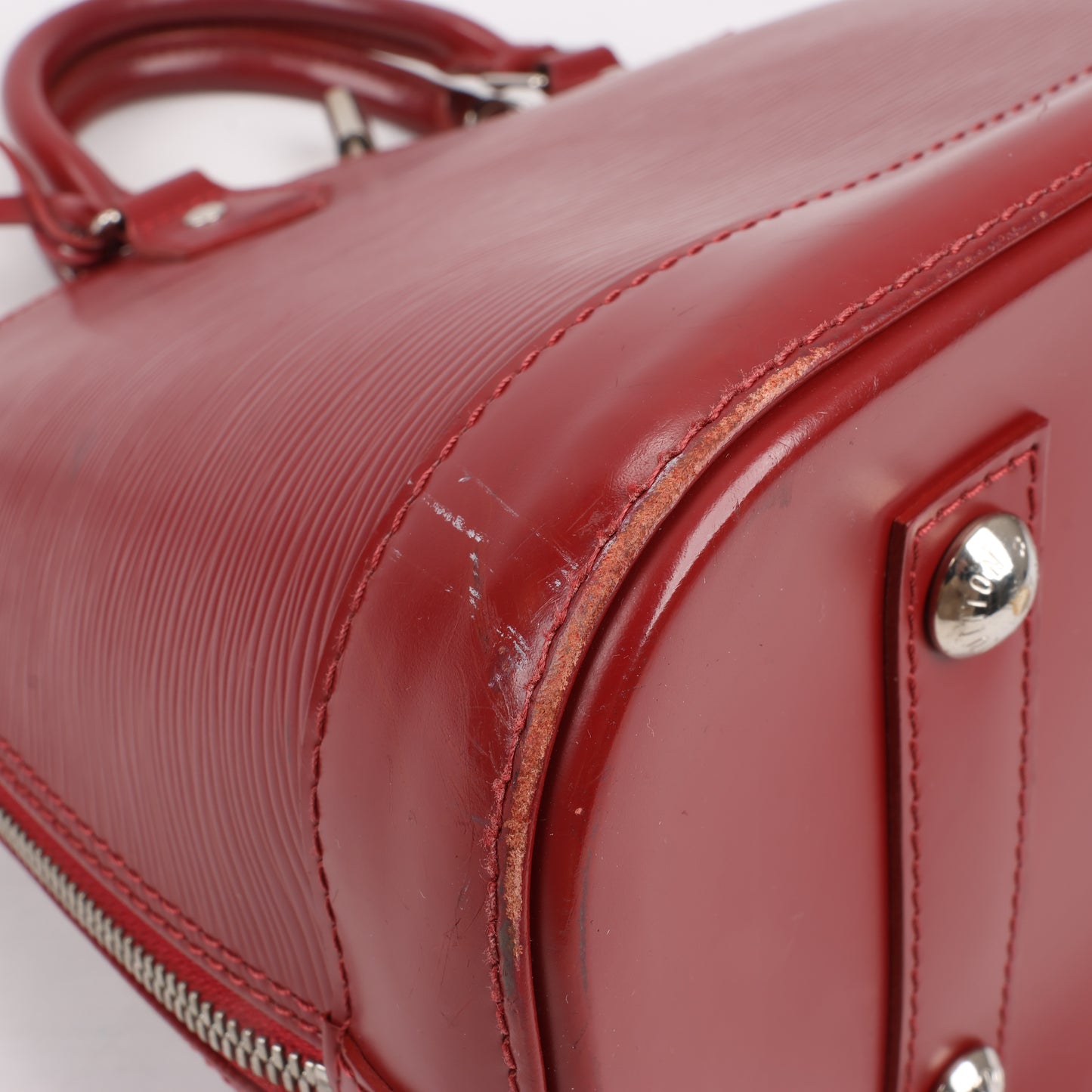 Louis Vuitton Epi Leather Alma Handbag in Deep Red M4030M