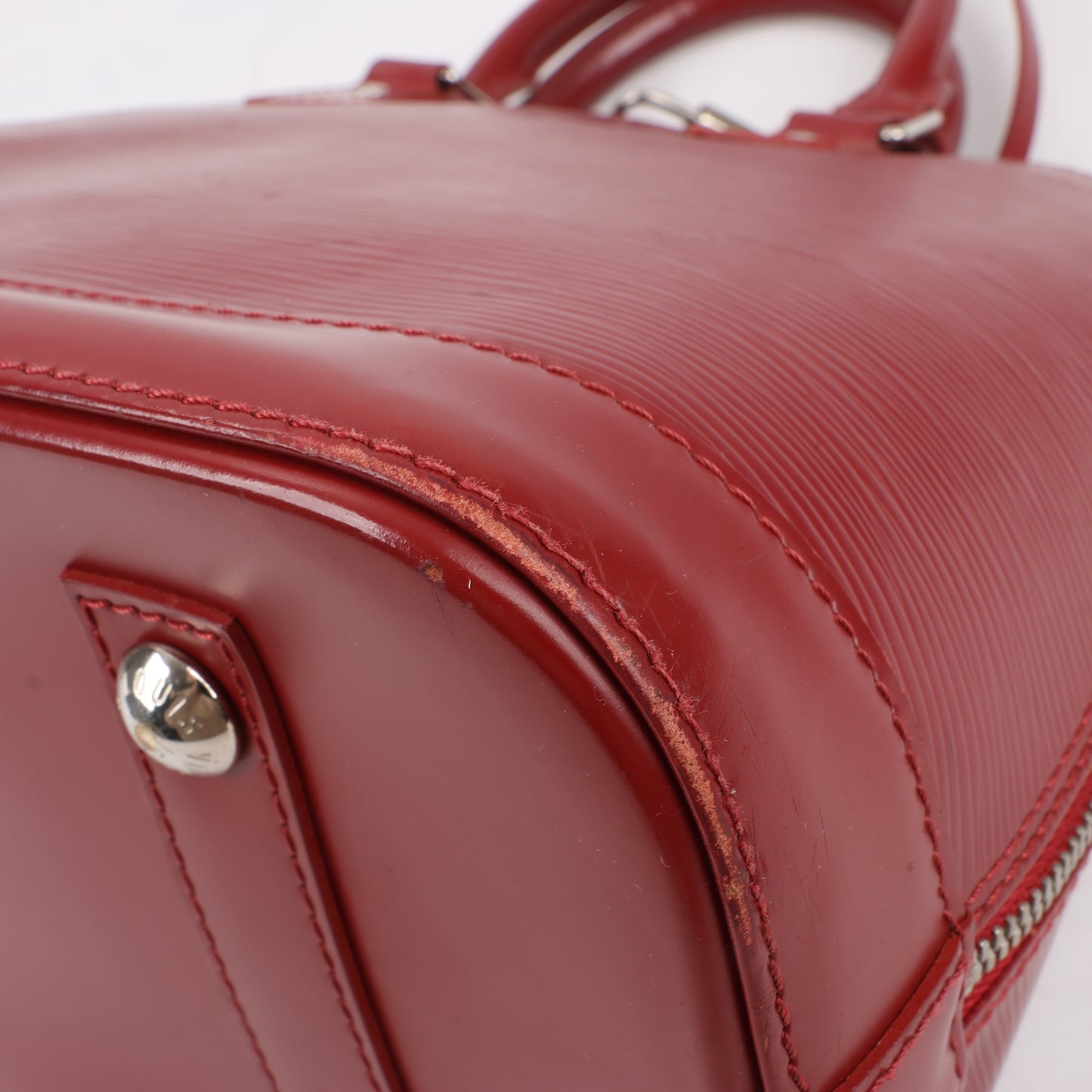 Louis Vuitton Epi Leather Alma Handbag in Deep Red M4030M