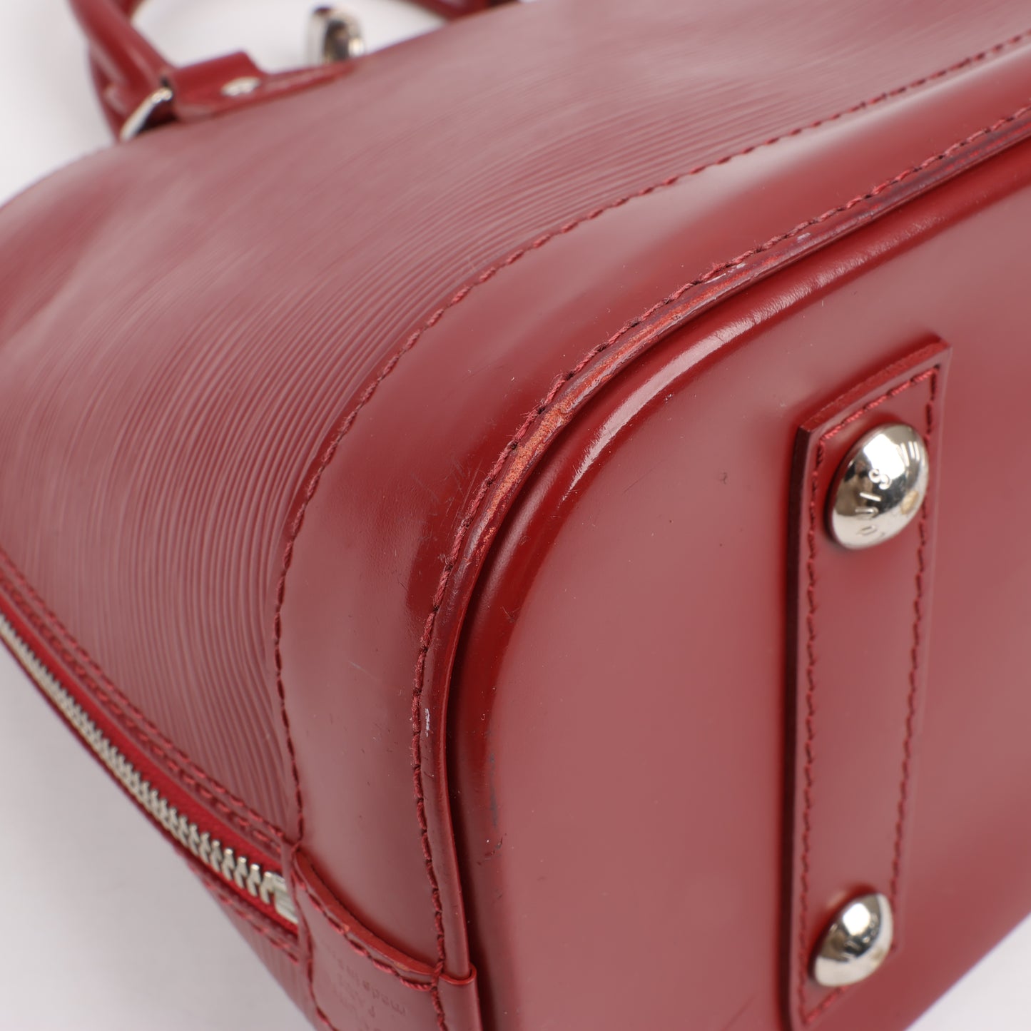Louis Vuitton Epi Leather Alma Handbag in Deep Red M4030M
