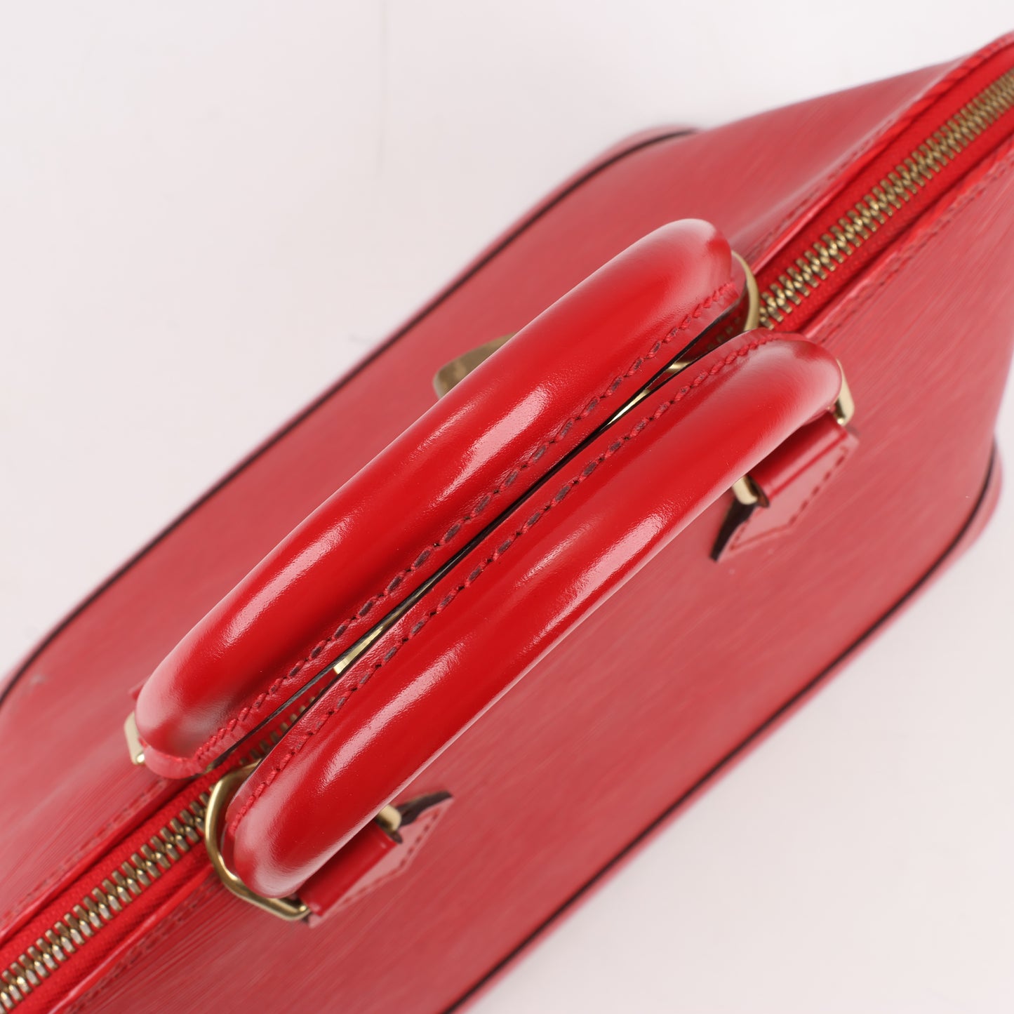 Louis Vuitton Alma PM Handtasche aus Epi-Leder in Rot