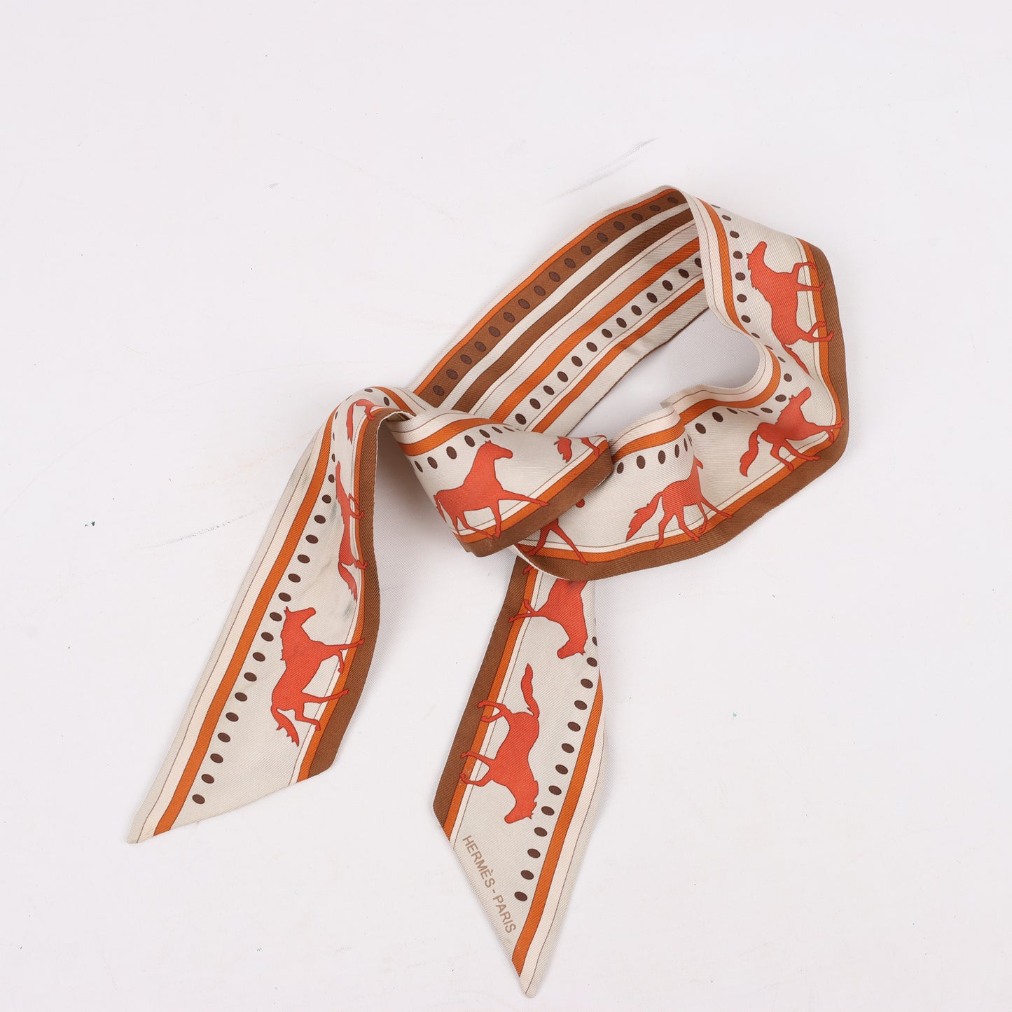 Hermès Sequences Horse Twilly Schals in Orange