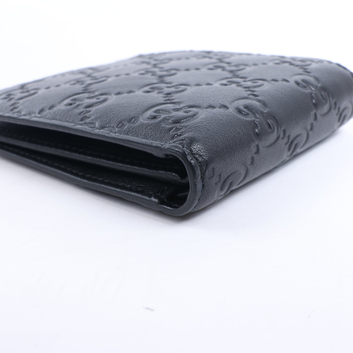 Gucci Guccissima 212185 Kompakte Geldbörse aus Leder in Schwarz
