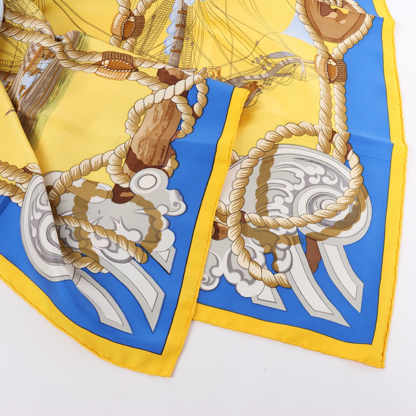 Hermès Carré 90 "Tribord" 100% Silk Scarf in Yellow and Blue