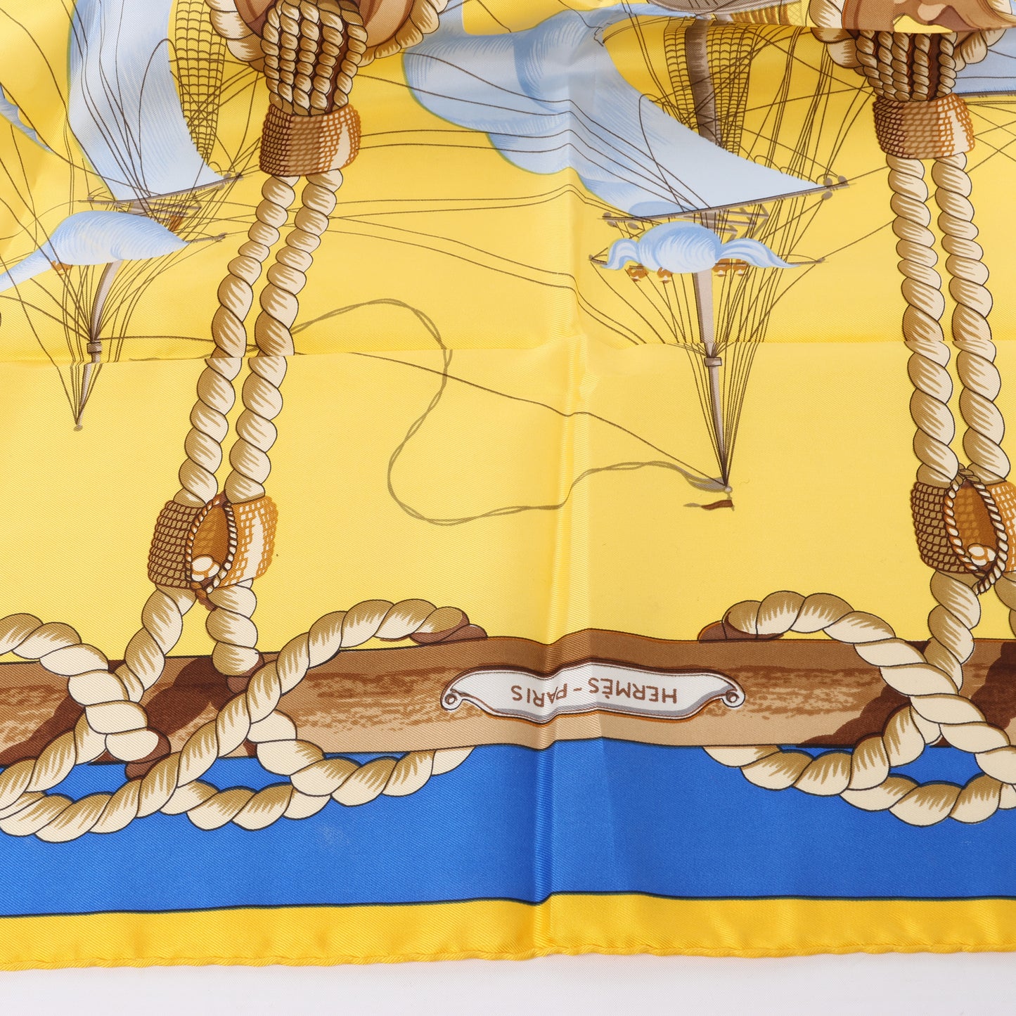 Hermès Carré 90 "Tribord" 100% Silk Scarf in Yellow and Blue