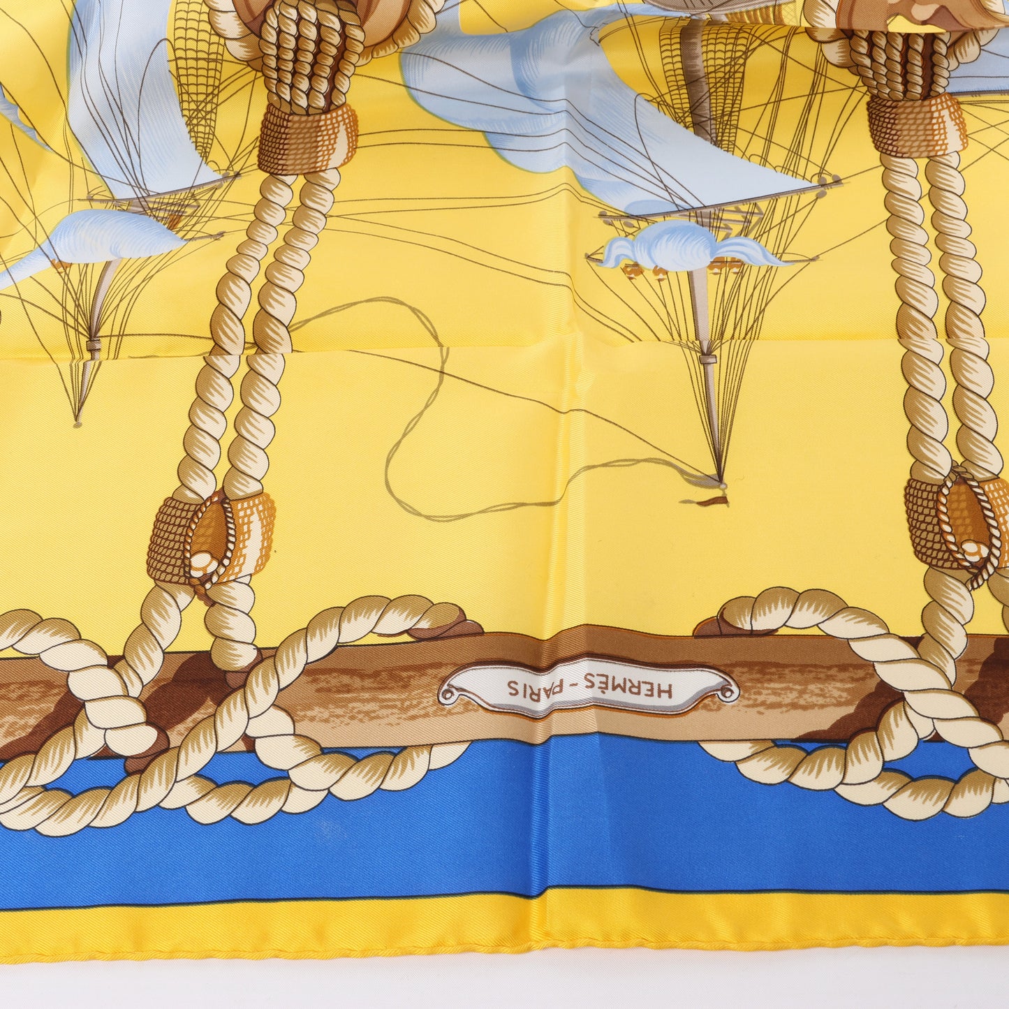 Hermès Carré 90 "Tribord" 100% Silk Scarf in Yellow and Blue