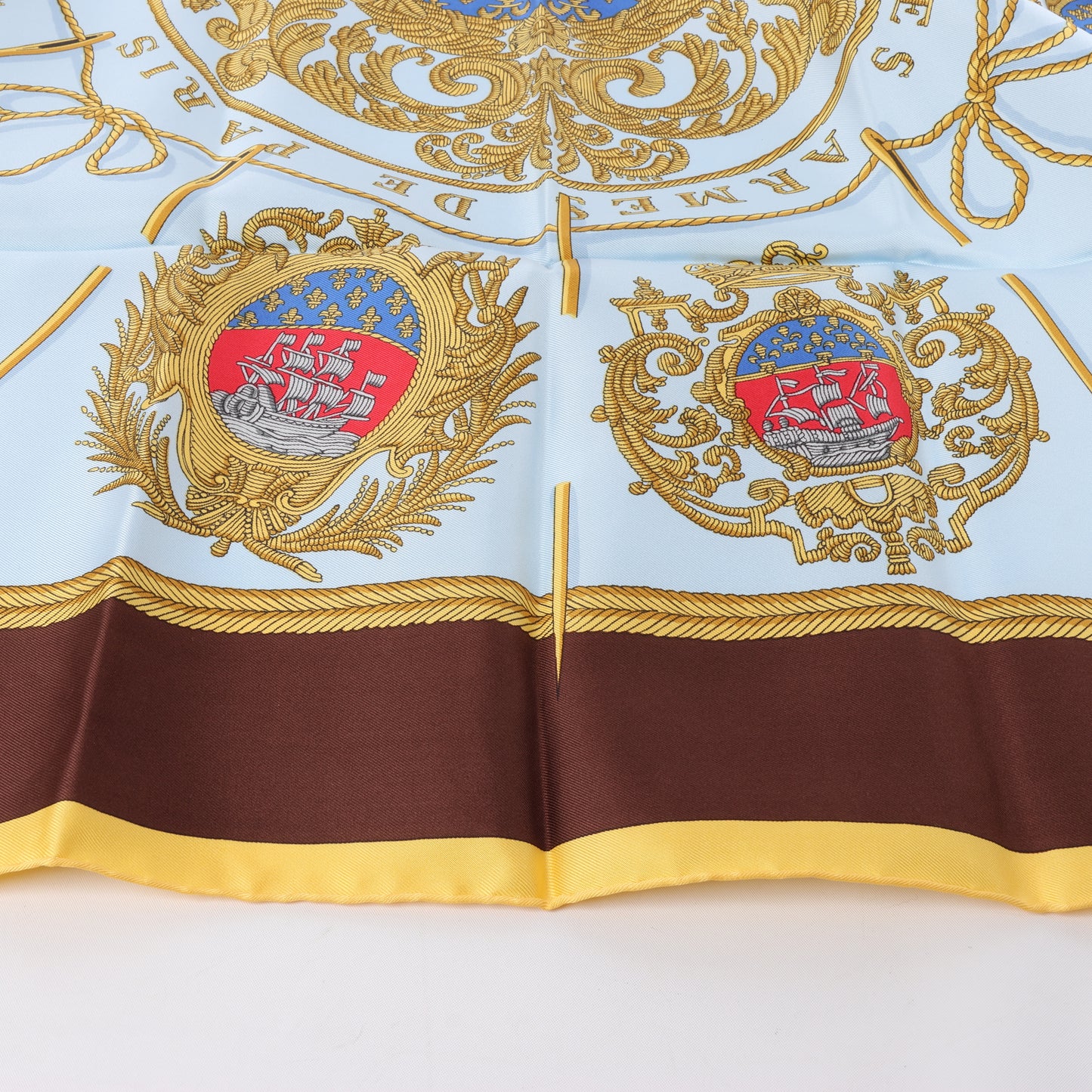 Hermès Carré 90 "Les Armes de Paris" 100% Silk Scarf in Brown and Blue