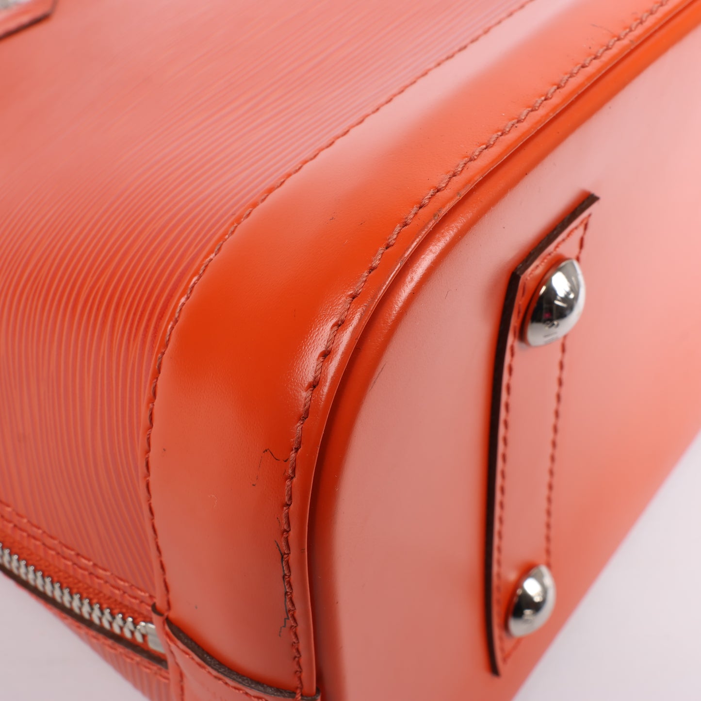 Sac à main Louis Vuitton Alma PM en cuir épi orange M40623
