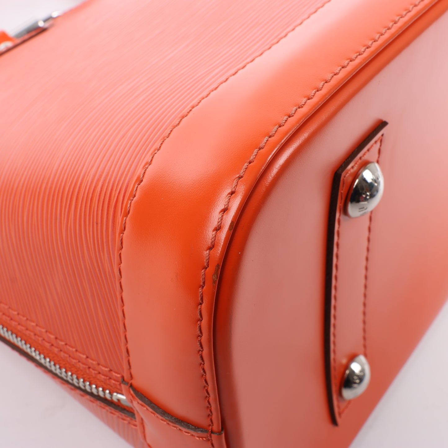 Sac à main Louis Vuitton Alma PM en cuir épi orange M40623