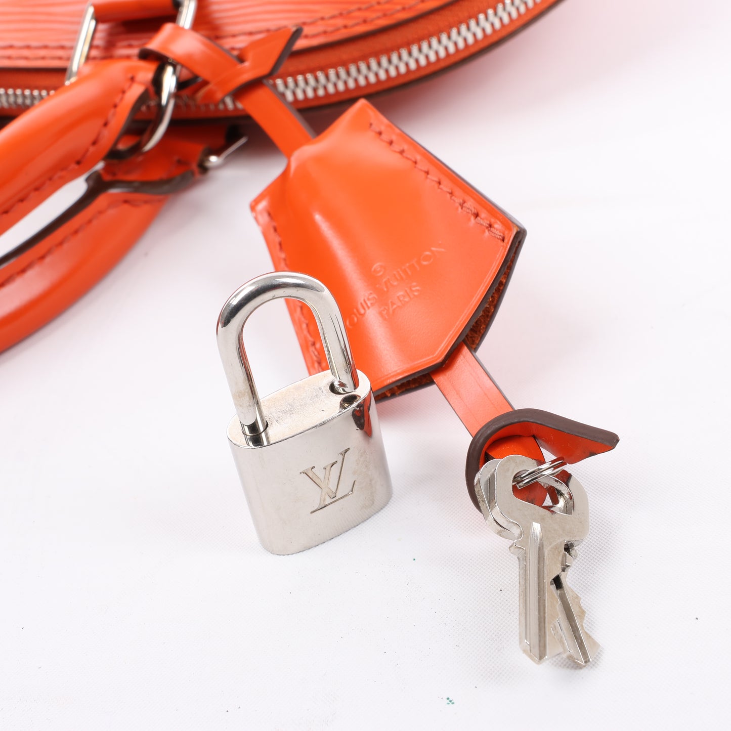 Sac à main Louis Vuitton Alma PM en cuir épi orange M40623