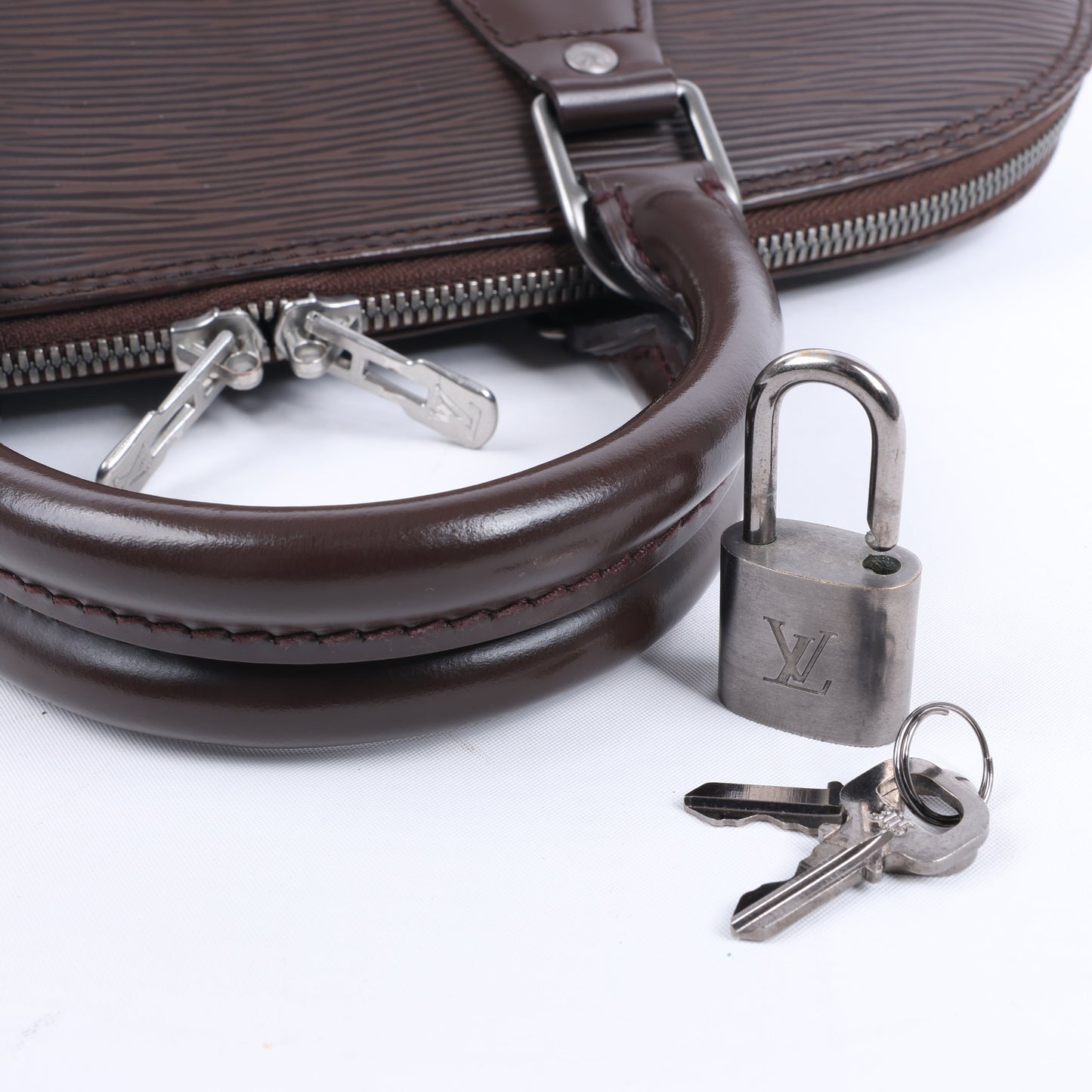 Louis Vuitton Epi Leather Alma PM Handbag in Brown M5214D