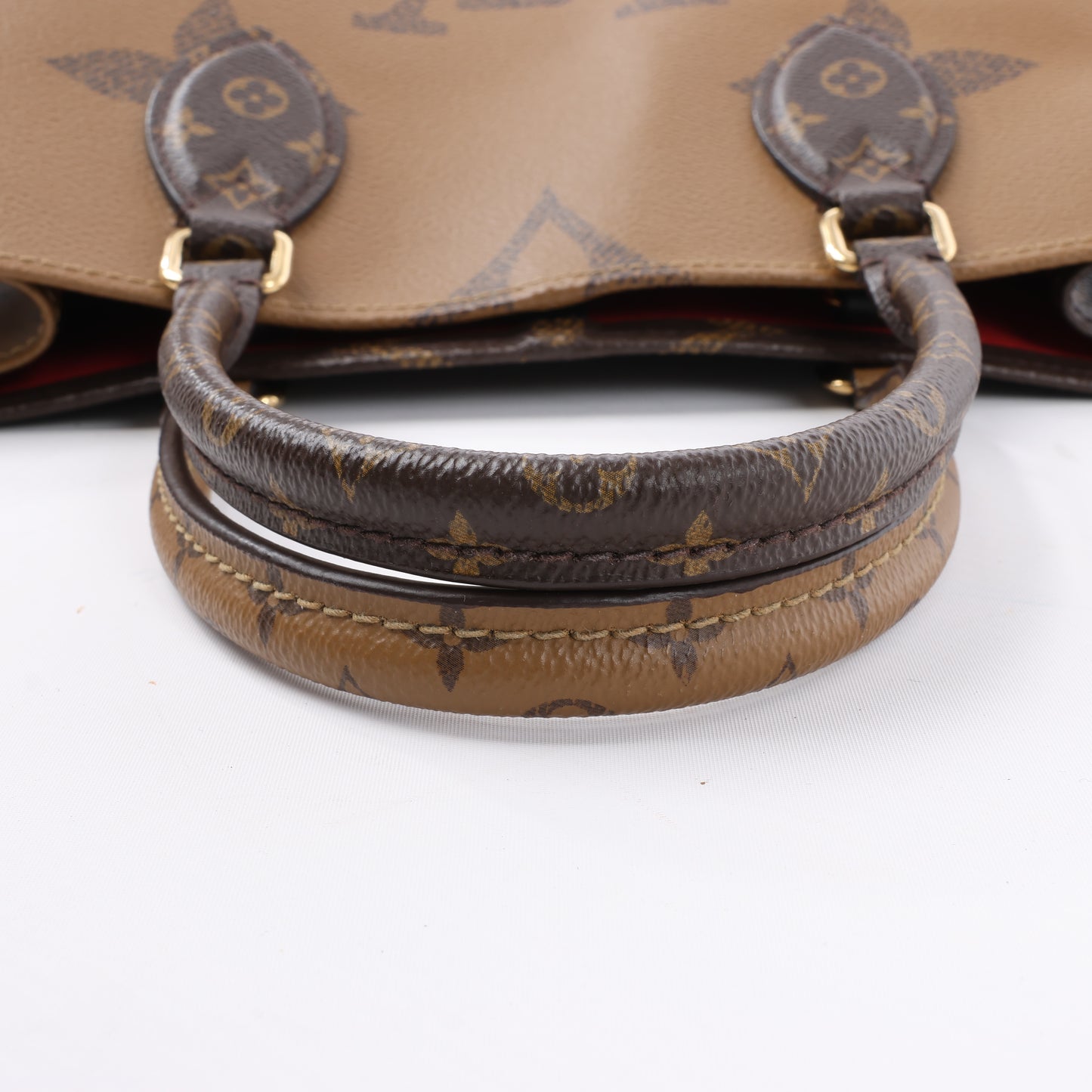 Louis Vuitton Riesiges Monogramm Reverse On the Go MM in Braun M45321