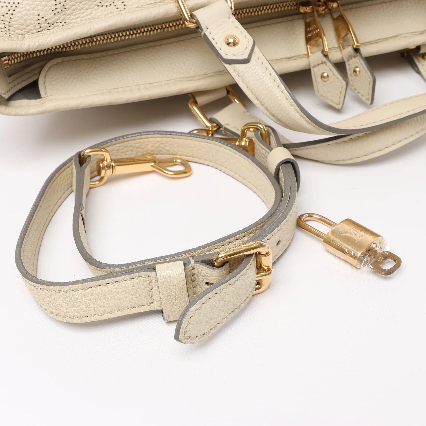 Sac à main Louis Vuitton Monogram Mahina Stella PM en cuir beige M93067