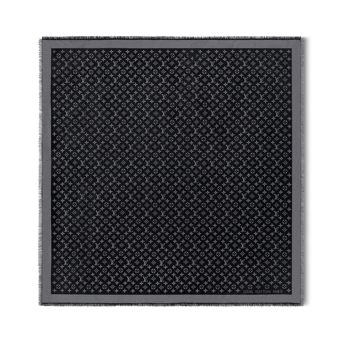 Black patterned fabric square on a white background