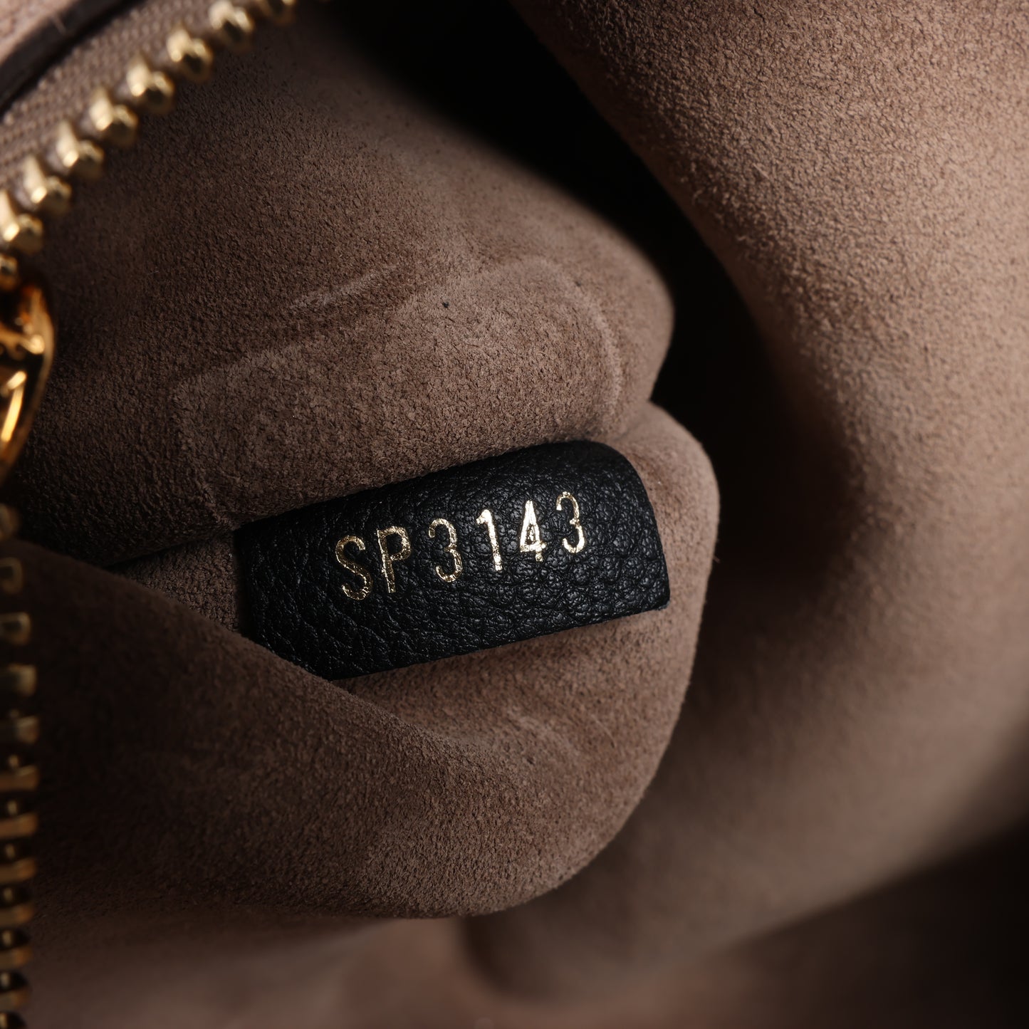 Sac à main Louis Vuitton Monogram x Trion W PM en marron et noir M40942