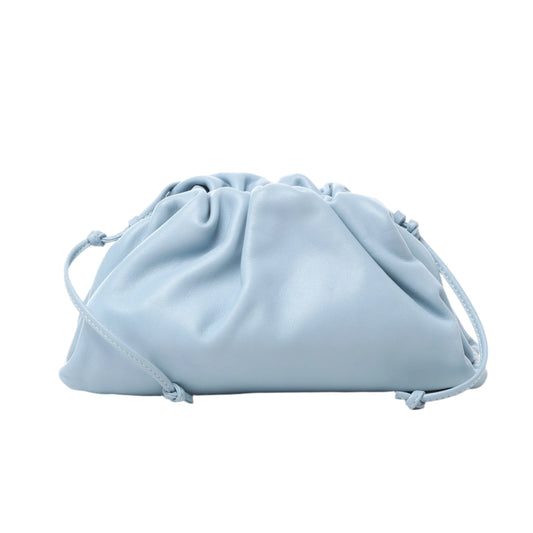 Front view of Bottega Veneta Mini The Pouch Crossbody bag in light blue soft leather with ruched top and thin drawstring strap, displayed against a white background.