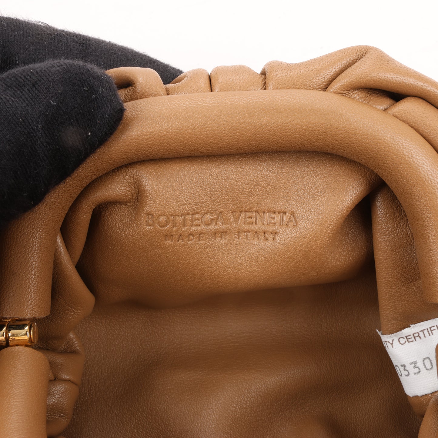 Bottega Veneta Micro The Pouch Leather Crossbody bag in Almond