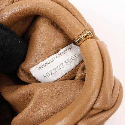 Bottega Veneta Micro The Pouch Leather Crossbody bag in Almond