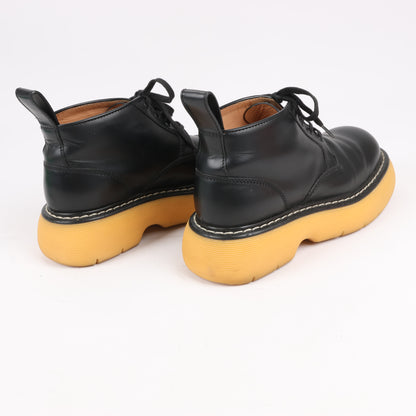 Bottega Veneta The Bounce Kurze Lederstiefel in Schwarz x Senfgelb, Größe 39 EU