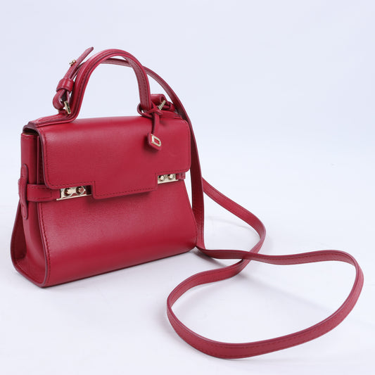 Delvaux Tempete Kleine 2-Wege-Handtasche aus Leder in Rot