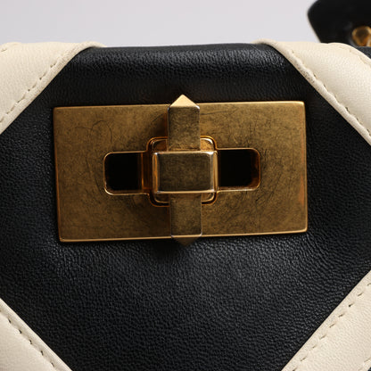 Valentino Garavani – 3-Wege-Schultertasche aus Leder mit römischen Nieten in Schwarz x Beige