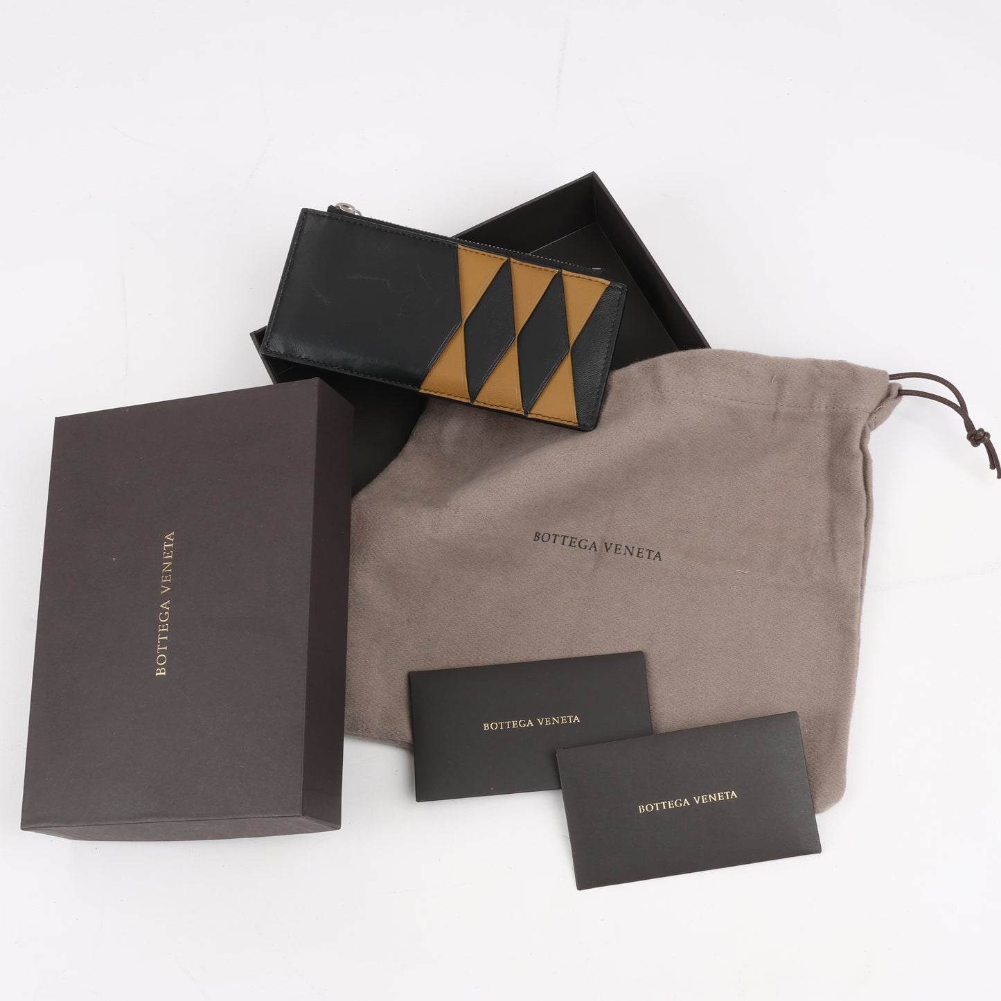 Bottega Veneta Leather Fragment Case in Black × Brown