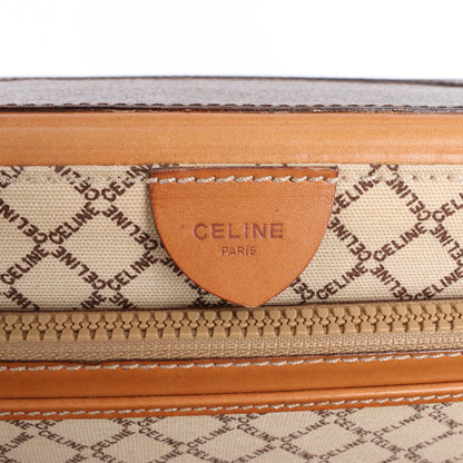 Celine Macadam – Braune Reisetasche aus PVC und Leder
