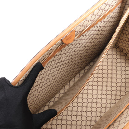 Celine Macadam – Braune Reisetasche aus PVC und Leder