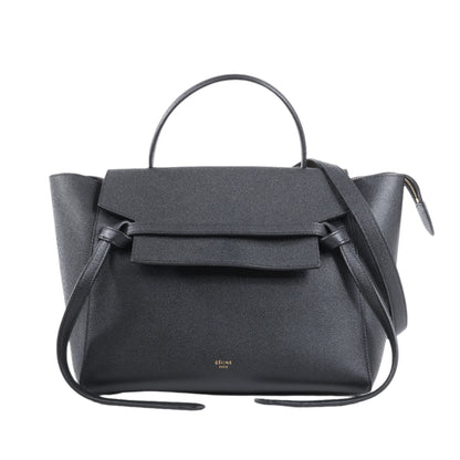 Black handbag with a strap on a white background