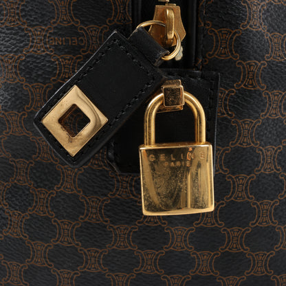 Celine Macadam Boston Reisetasche aus PVC und Leder in Schwarz × Braun