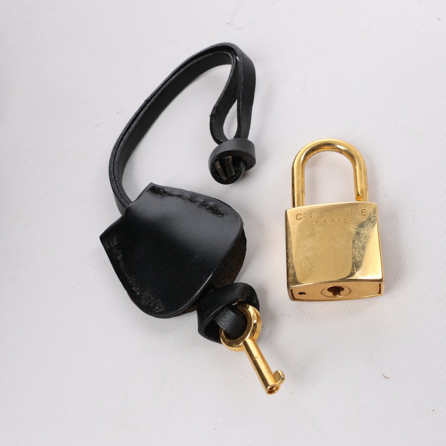 Celine Macadam Boston Reisetasche aus PVC und Leder in Schwarz × Braun
