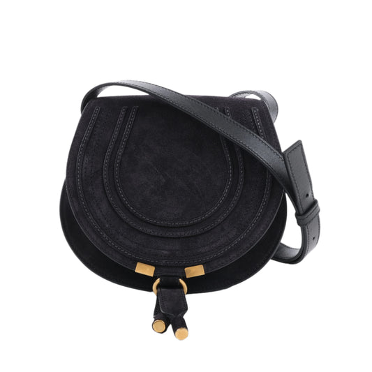 Black round handbag with gold accents on a white background