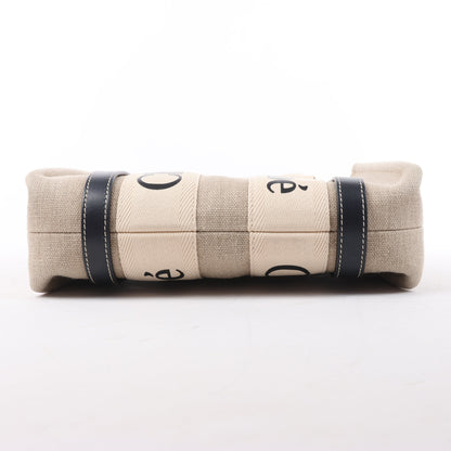 Chloé Woody Kleine 2-Wege-Handtasche aus Canvas und Leder in Beige x Schwarz