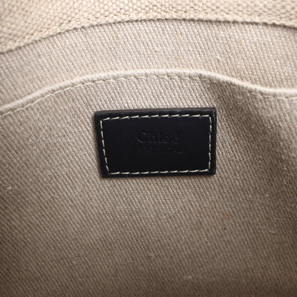 Chloé Woody Kleine 2-Wege-Handtasche aus Canvas und Leder in Beige x Schwarz