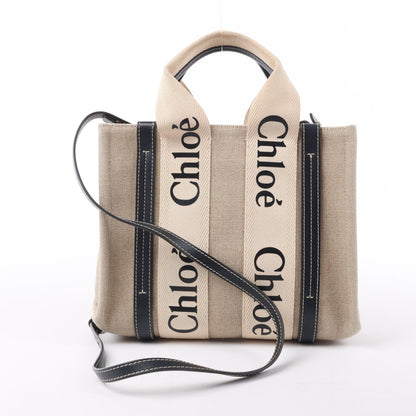 Chloé Woody Kleine 2-Wege-Handtasche aus Canvas und Leder in Beige x Schwarz