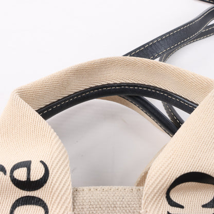 Chloé Woody Kleine 2-Wege-Handtasche aus Canvas und Leder in Beige x Schwarz