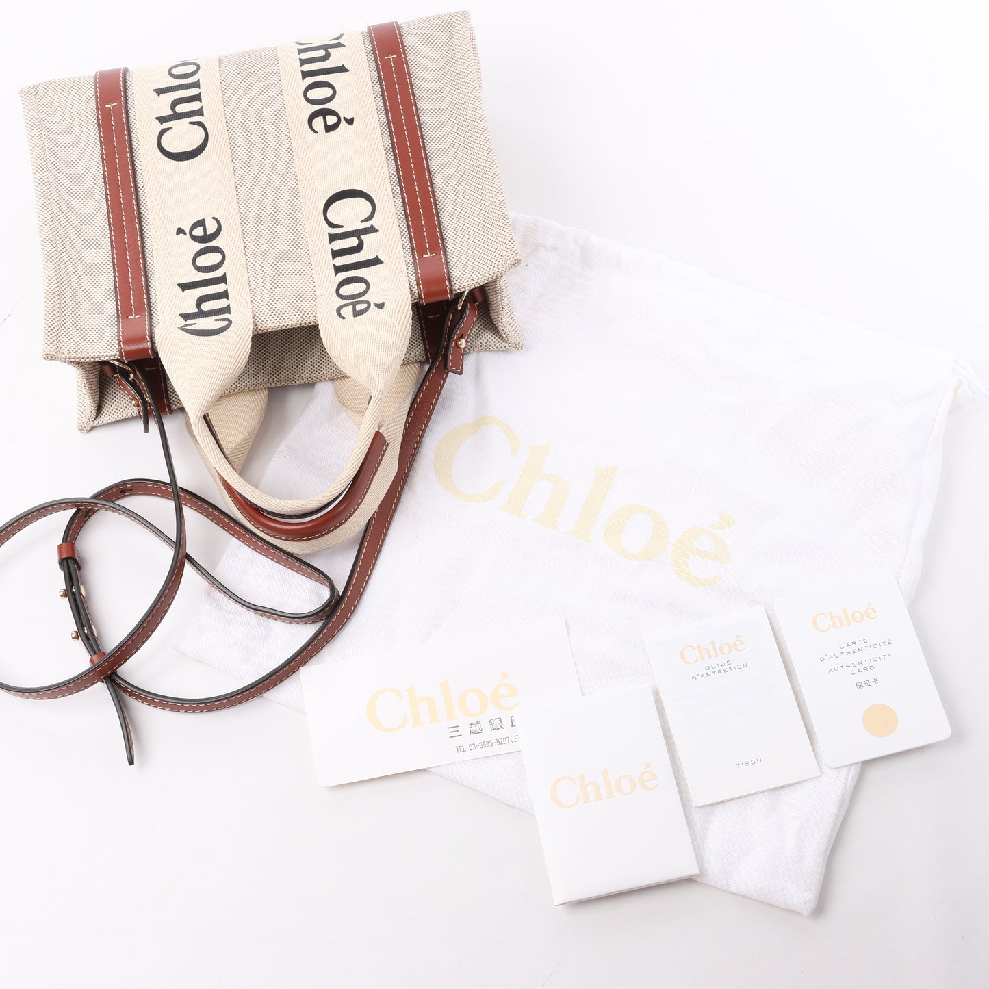 Chloé Woody Kleine 2-Wege-Handtasche aus Canvas und Leder in Beige x Braun
