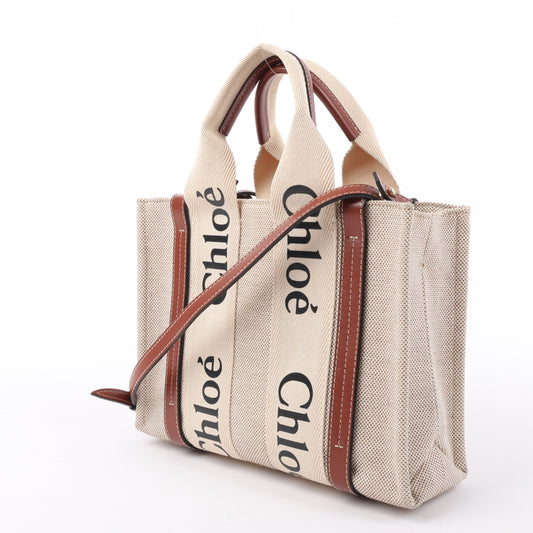 Chloé Woody Kleine 2-Wege-Handtasche aus Canvas und Leder in Beige x Braun