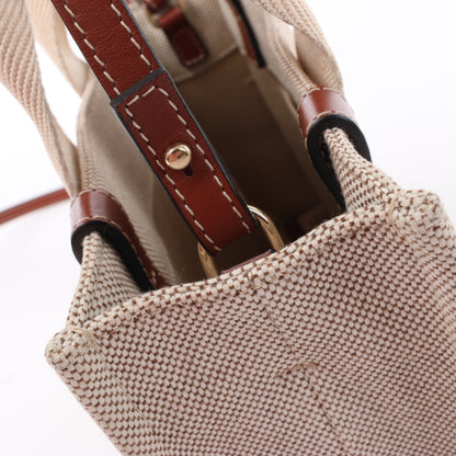 Chloé Woody Kleine 2-Wege-Handtasche aus Canvas und Leder in Beige x Braun
