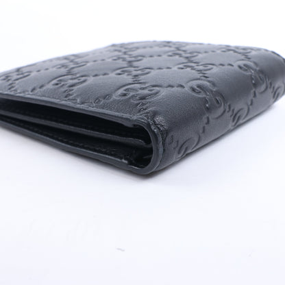 Gucci Guccissima 212185 Kompakte Geldbörse aus Leder in Schwarz