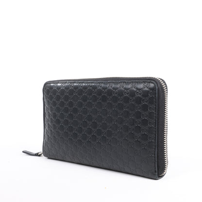 Gucci Microguccissima – Große Organizer-Geldbörse mit Rundum-Reißverschluss in Schwarz