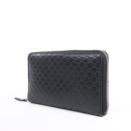 Gucci Microguccissima – Große Organizer-Geldbörse mit Rundum-Reißverschluss in Schwarz