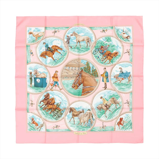 Hermès Carré 90 "Auteuil en Mai" Silk Scarf in pink, featuring equestrian-themed illustrations within circular frames, including horses, riders, and trainers, bordered by a solid pink edge with intricate detailing on soft silk fabric.