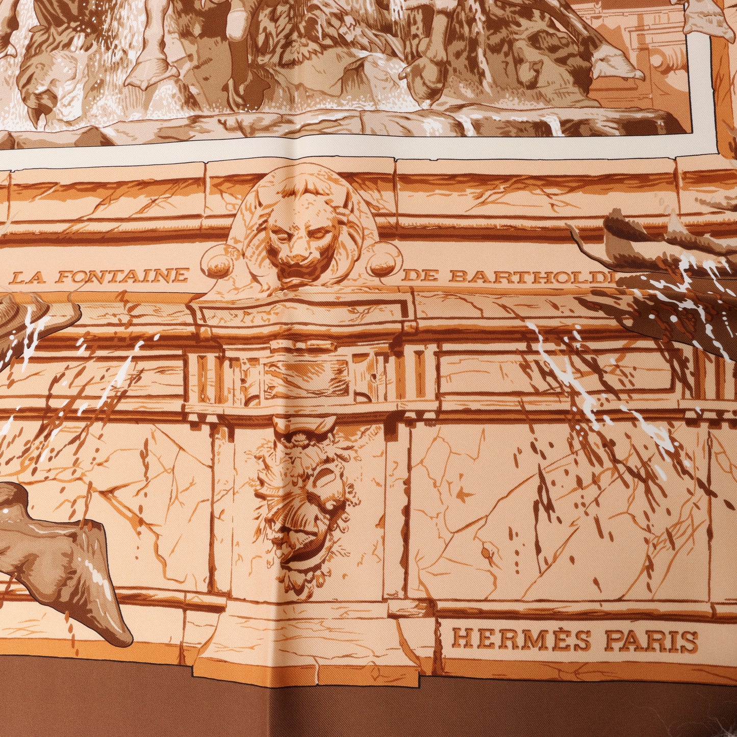 Hermès Carré 90 " LA FONTAINE DE BARTHOLD" 100% Silk Scarf in Brown