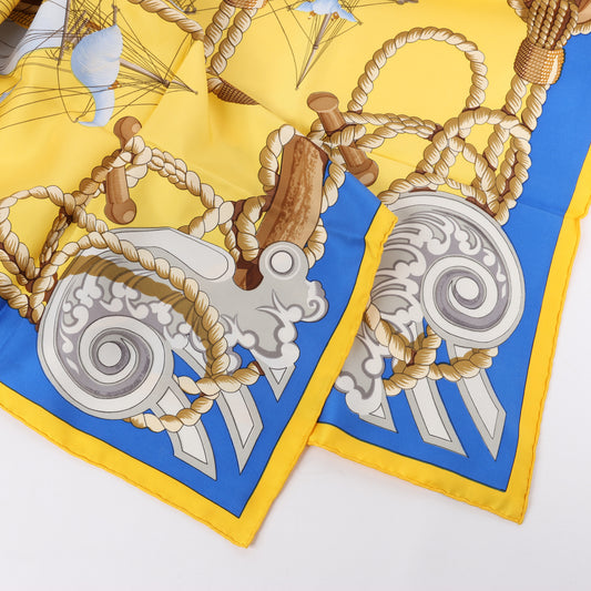 Hermès Carré 90 "Tribord" 100% Silk Scarf in Yellow and Blue