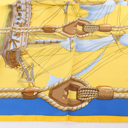 Hermès Carré 90 "Tribord" 100% Silk Scarf in Yellow and Blue